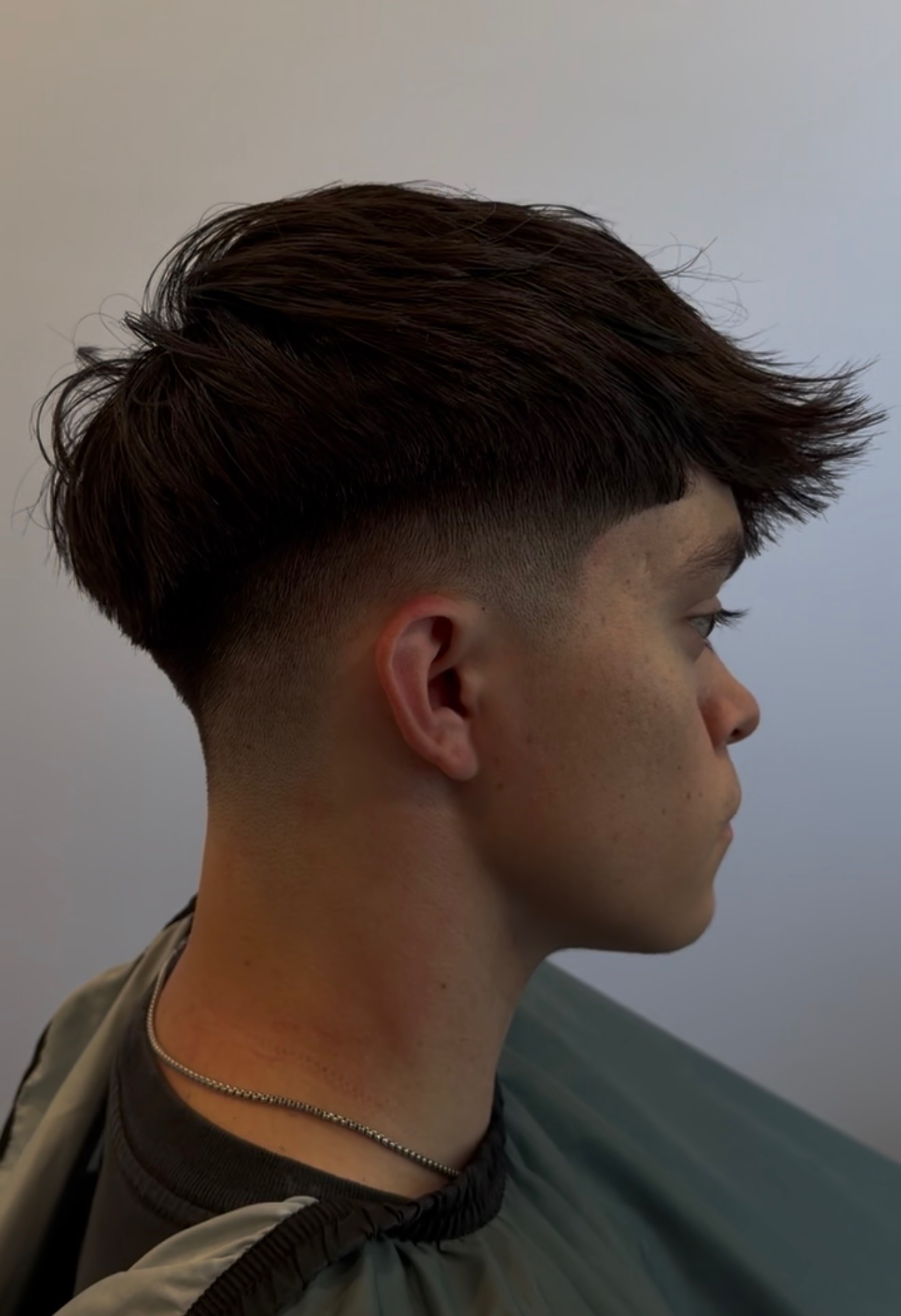 Modern textured crop with skin fade, side profile, cut by Acero by Omar in South Jordan, UT