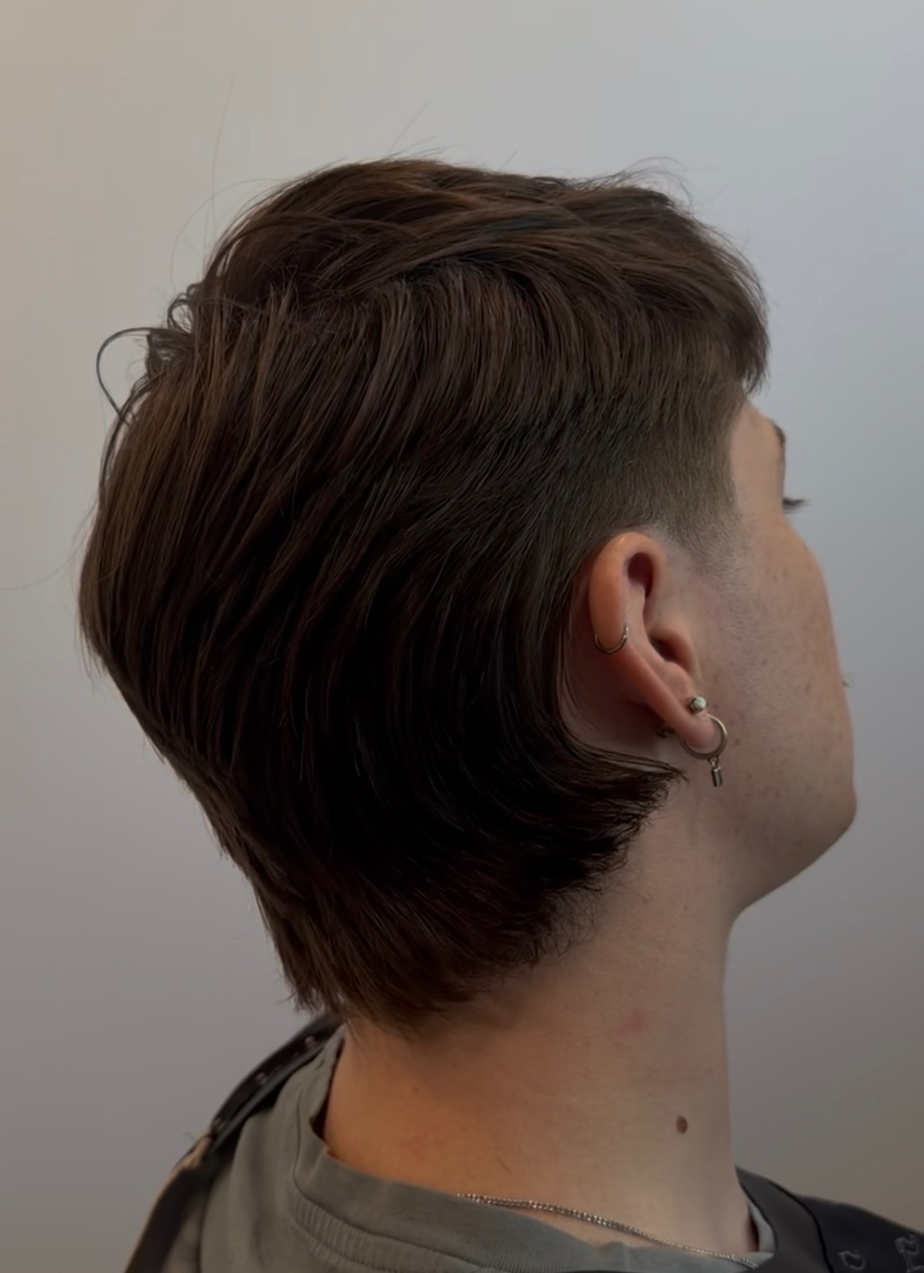 Textured fringe haircut with tapered sides, side profile, cut by Acero by Omar in South Jordan, UT